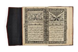 An Indian Qur'an, after Haji Muhammad Sa'id Tajir, lithographed in Arabic and Urdu [Eastern