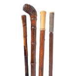 Y Four various walking sticks, the first early-mid 18th century