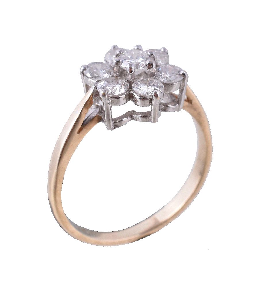 A diamond cluster ring, set with brilliant cut diamonds, approximately 0.75 carats total, in claw