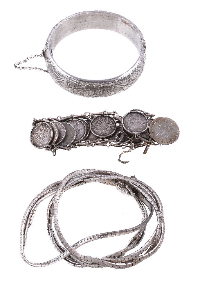 A 1960s silver bangle, Birmingham 1962, the hinged silver bracelet with foliate decoration