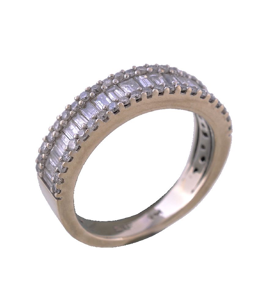 A diamond half eternity ring, the baguette cut diamonds set between two rows of brilliant cut