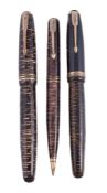 Parker, Vacumatic, a brown striated fountain pen, the cap with a gilt metal arrow clip and cap band,