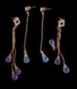 A pair of amethyst and diamond ear pendants, each set with three briolette cut amethysts,