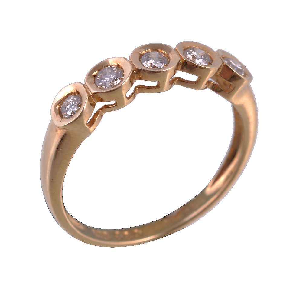 An 18 carat gold diamond five stone ring, the brilliant cut diamonds within a polished gold coloured