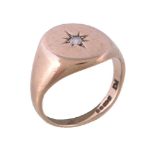 A 9 carat gold diamond signet ring, set with a brilliant cut diamond, estimated to weigh 0.08