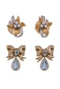A pair of diamond and aquamarine bow ear pendants, the diamond set bow with a central circular cut