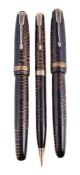 Parker, Vacumatic, a brown striated fountain pen, the cap with a gilt metal arrow clip and cap band,
