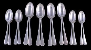 A set of eight old English pattern table and eight dessert spoons by D. & J. Wellby, the table