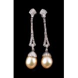 A pair of South Sea cultured pearl and diamond ear pendants, the 1.2cm South Sea cultured pearls set