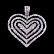 An 18 carat gold diamond heart pendant by Theo Fennel, the heart shaped pendant set throughout