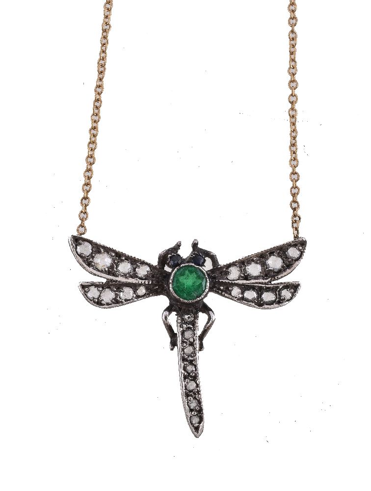 A rose cut diamond and emerald dragonfly pendant, the wings and abdomen set with rose cut