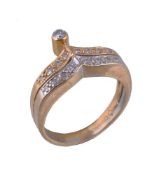 A diamond dress ring by Cadeaux, the two colour wishbone shaped ring set with brilliant cut