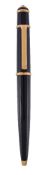 Cartier, Diabolo, a black ballpoint pen, with gilt metal clip and band, with a Cartier box,