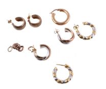 A pair of 9 carat gold three colour ear hoops, a pair of two colour 9 carat gold ropetwist ear