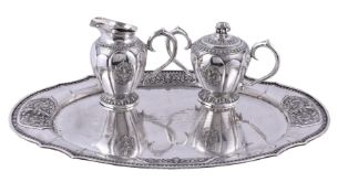 A Thai silver coloured tray, cream jug and sugar basin by Thai Nakon, Bangkok, .925 standard,
