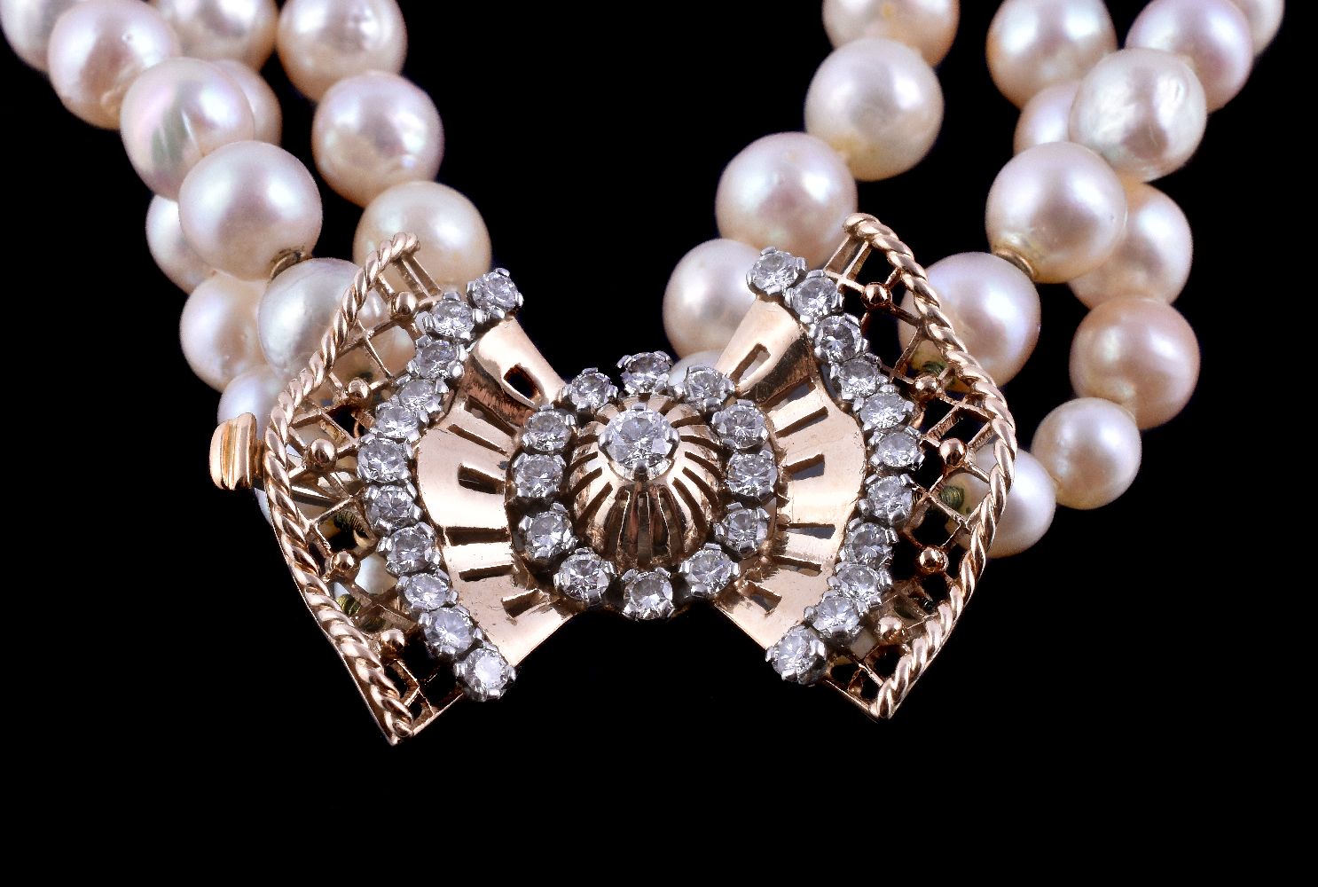 A three strand cultured pearl and diamond necklace, the three rows with graduating cultured - Image 2 of 2