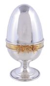 A silver parcel gilt surprise Easter egg by David Rhys Mills, London 2004, opening to reveal a