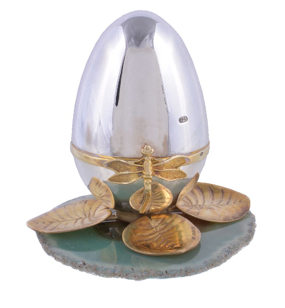 A silver parcel gilt surprise Easter egg by David Rhys Mills, London 2000 (millennium mark), opening