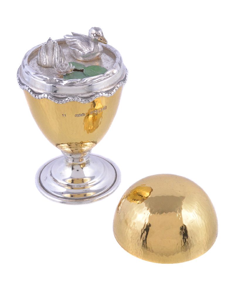 A hammered silver parcel gilt surprise Easter egg by David Rhys Mills, London 1996, opening to - Image 2 of 2