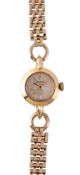 Avia, a lady's 18 carat gold wristwatch, no. 6050 2, Swiss manual wind movement, 17 jewels, silvered