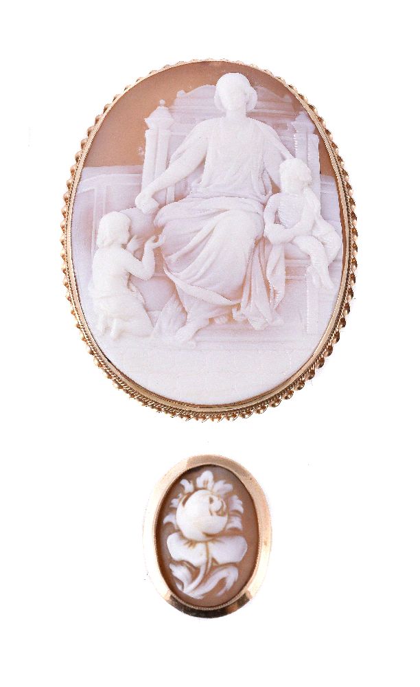 A shell cameo brooch, the oval panel carved with the Virgin Mary, Jesus and St. John the Baptist, in