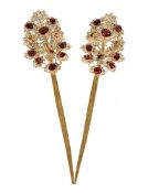 A pair of Chinese white metal and ruby hair ornaments, each with filigree 'flower and bird'