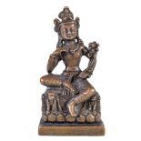 A bronze figure of Padmapani, in Kashmir style, seated on a lion throne with legs loosely crossed