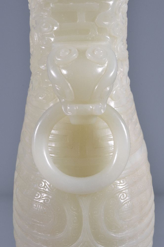 A Chinese white jade vase, hu, the pear-shaped vessel quartered on each side by high strapwork - Image 3 of 6