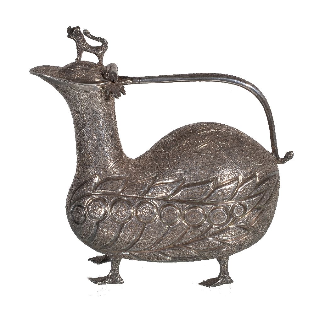 An Indian silver zoomorphic ewer, Kashmir, early 20th century, in the form of a stylised four-legged