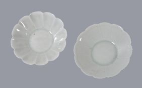 Two small Qingbai porcelain foliate dishes, possibly Song Dynasty, each of chrysanthemum form, the