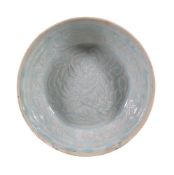 A Chinese moulded Qingbai ‘phoenix’ bowl, Song dynasty, moulded to the interior with a pair of