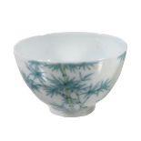 A small Doucai ' Bamboo ' wine cup, delicately potted with deep rounded sides rising from a short