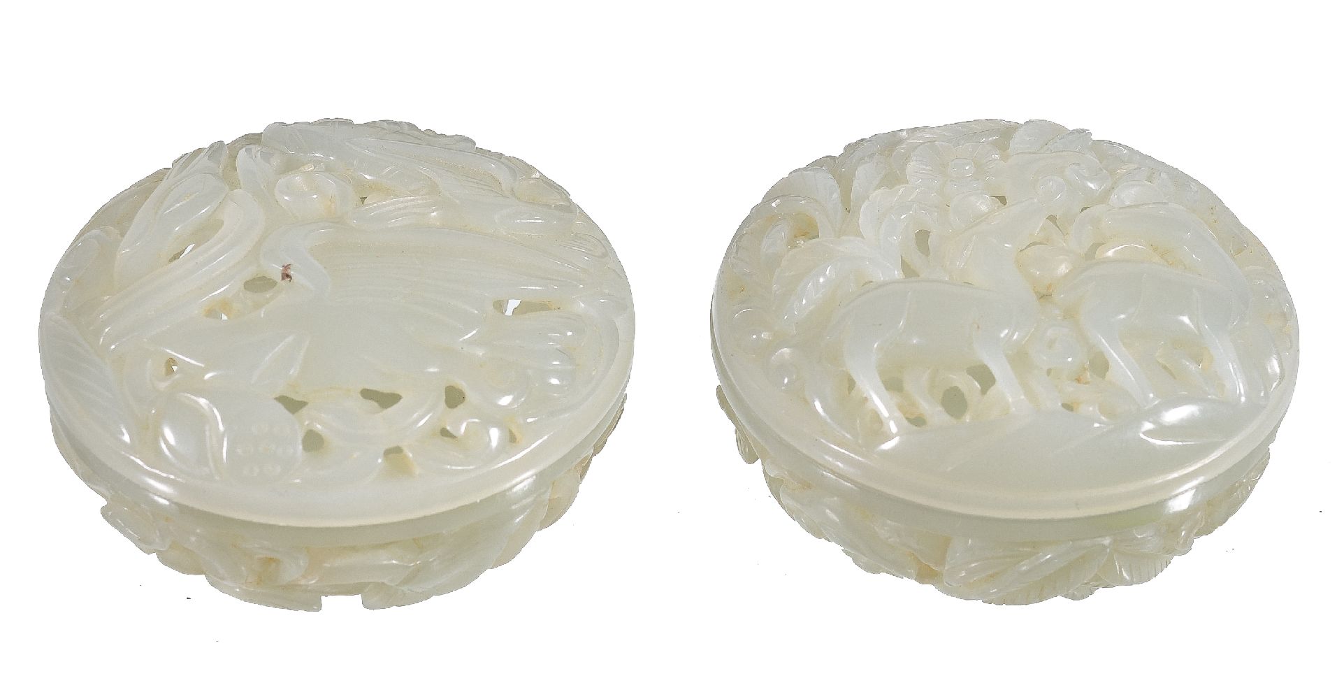 A pair of Chinese pale celadon pierced 'goose and lotus' circular boxes and covers, 5.2cm