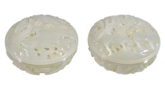 A pair of Chinese pale celadon pierced 'goose and lotus' circular boxes and covers, 5.2cm