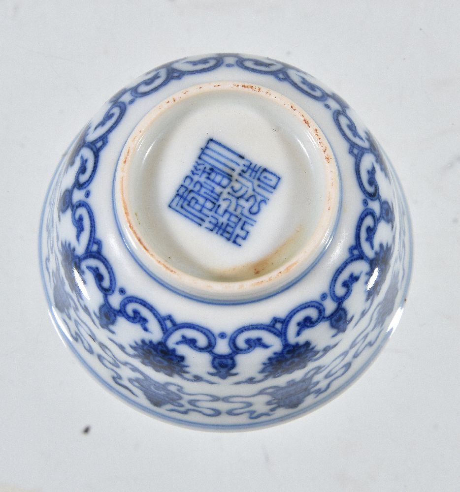 A Chinese blue and white small bowl, the steep sides with the bajixiang above stylized lotus - Image 3 of 3