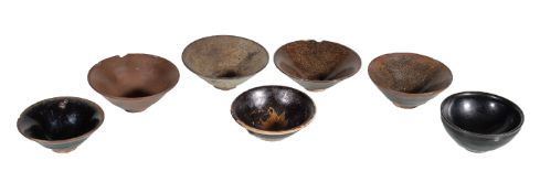 Seven various Jian ware and 'Hare's Fur' bowls, Song Dynasty, with various black, russet and grey
