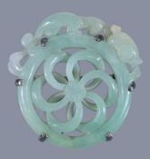 A Chinese jadeite silver-mounted 'chilong and flower' brooch, of circular form, 5cm x 5cm 银镶翠螭龙胸针