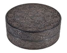 A Chinese hardwood 'Dragon' box and cover, possibly Zitan wood, the flat top boldly carved in high