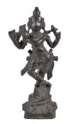 A bronze figure of Krishna playing the flute, Southern India, circa 17th century, standing with