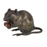 A large Chinese or Japanese bronze rat, seated holding a chestnut, marked to base