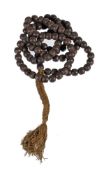 A Chinese wood bead necklace, the evenly sized 108 aloeswood beads approximately 1.5cm diameter x