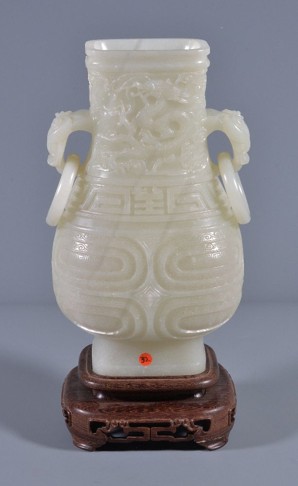 A Chinese white jade vase, hu, the pear-shaped vessel quartered on each side by high strapwork - Image 4 of 6