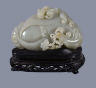 A Chinese celadon jade 'chilong and phoenix' boulder carving, Qing Dynasty, well carved, the front