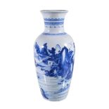 A Chinese blue and white vase, Qing Dynasty, probably Kangxi, brightly painted with a mountainous