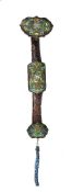 A large Chinese hardwood cloisonné inlaid ruyi sceptre, Qing Dynasty, inset with green-ground