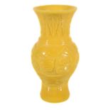 A Chinese Imperial yellow Peking glass vase, Qing Dynasty, standing on a slightly splayed base