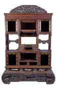 Y A lacquered and inlaid wood Shodana, comprising shelves, drawers and cupboards,