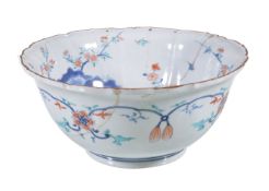 A Japanese Arita bowl, the deep bowl decorated in iron-red, turquoise and underglaze blue, the lobed
