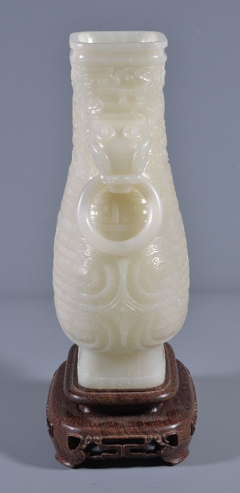 A Chinese white jade vase, hu, the pear-shaped vessel quartered on each side by high strapwork - Image 5 of 6