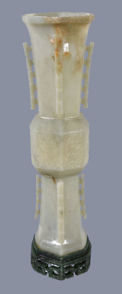 A Chinese celadon jade gu-shaped octagonal vase, with russet inclusions around part of the neck, - Image 2 of 5